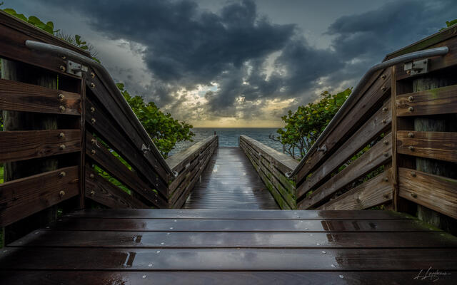 Stormy Boardwalk Reflections