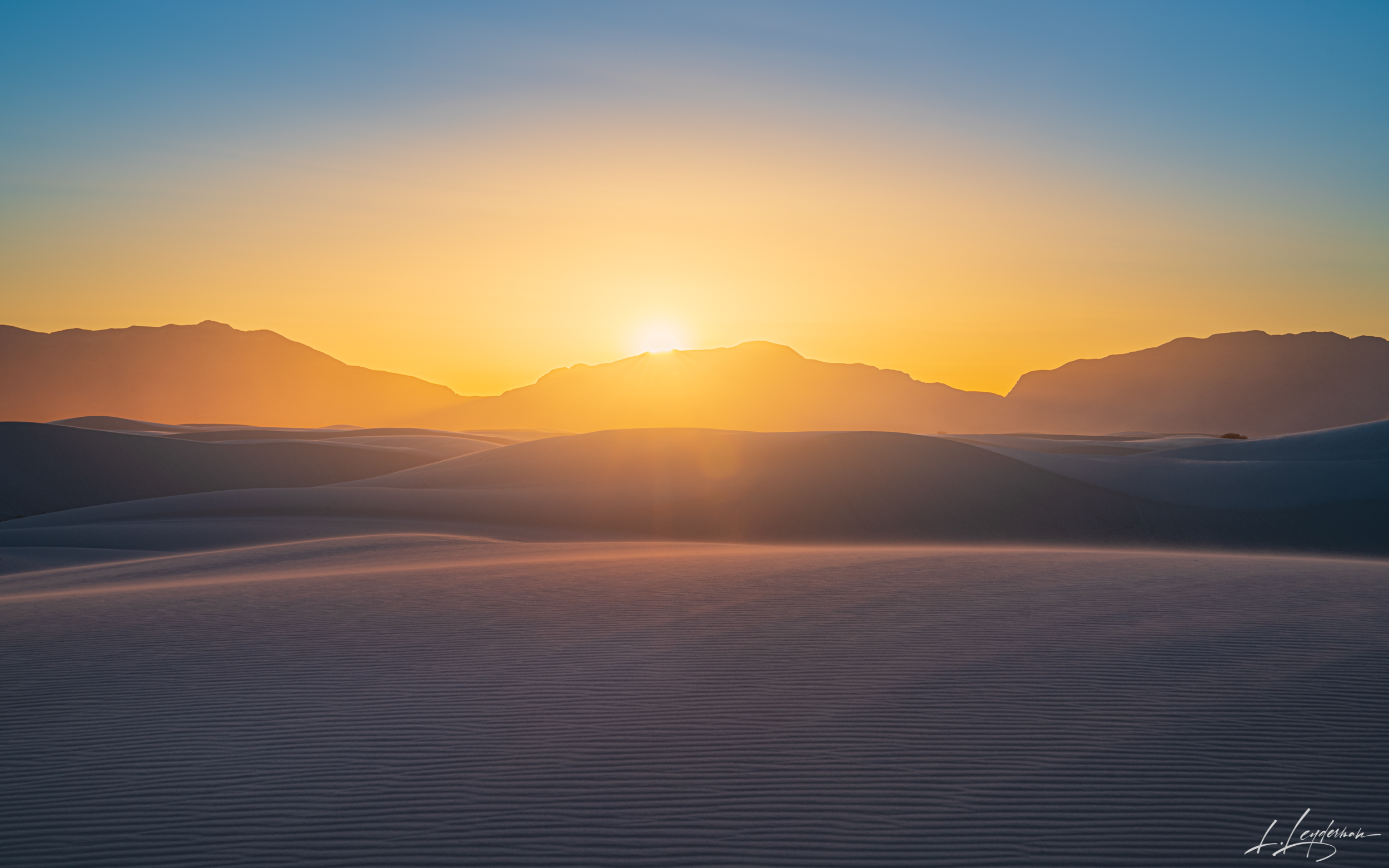 Pearlescent hues paint this image a magical serene. Mother nature was deliberate in her creation of this moment. The sun sends...